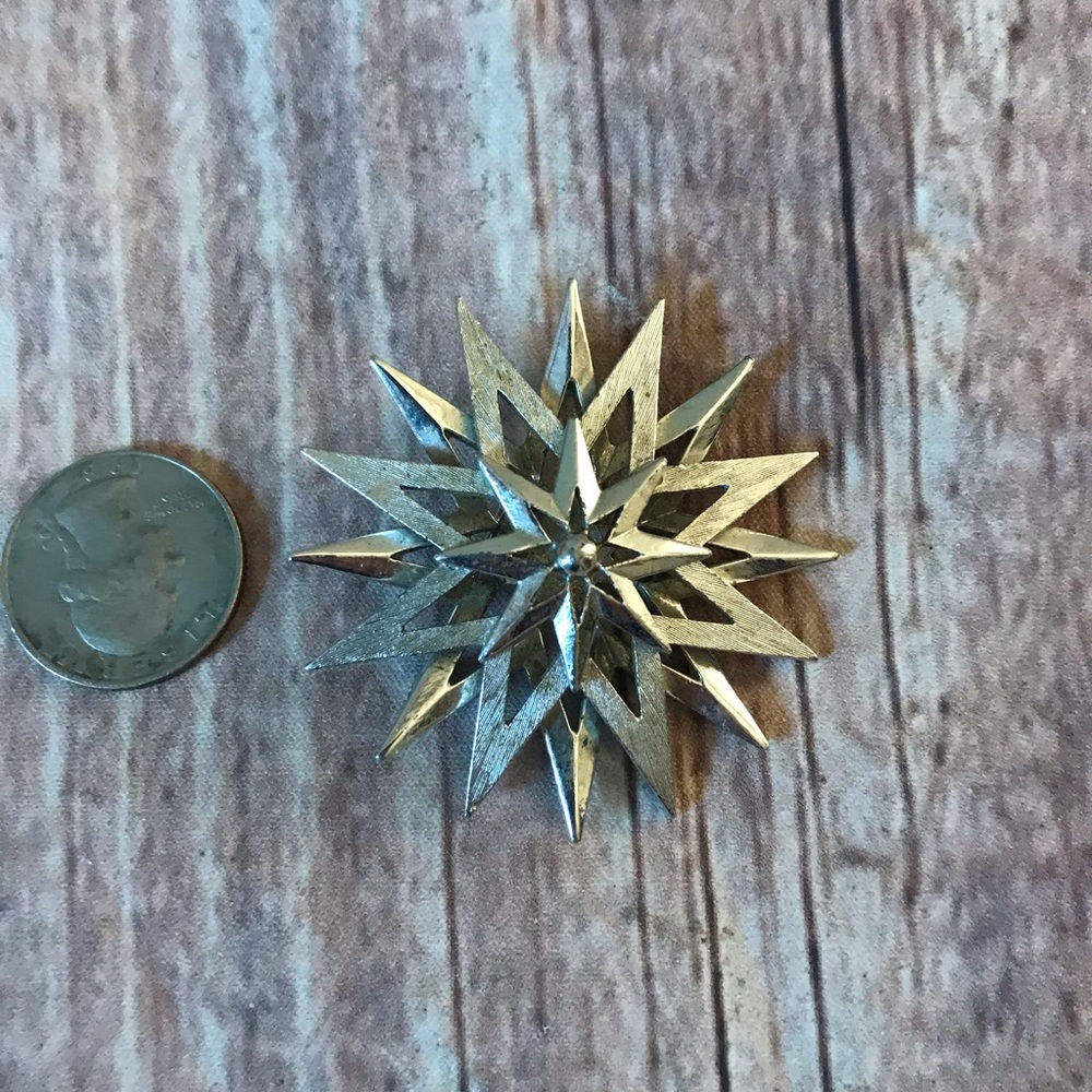 Vintage atomic starburst brooch